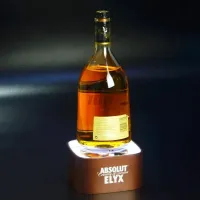 Illuminated Bottle Glorifiers vs Static Bottle Displays
