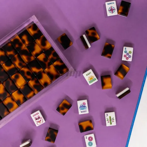 Tortoise shell American Mahjong tiles scattered display